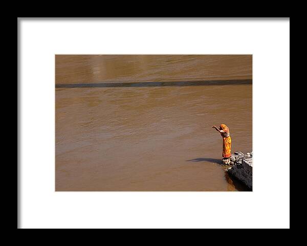 Hinduism Framed Print featuring the photograph Praying On Banks Of Holy Ganges In by Claude Renault