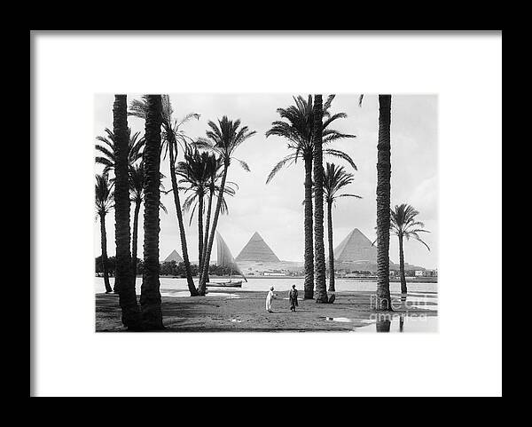 People Framed Print featuring the photograph Pyramids And The Nile River by Bettmann