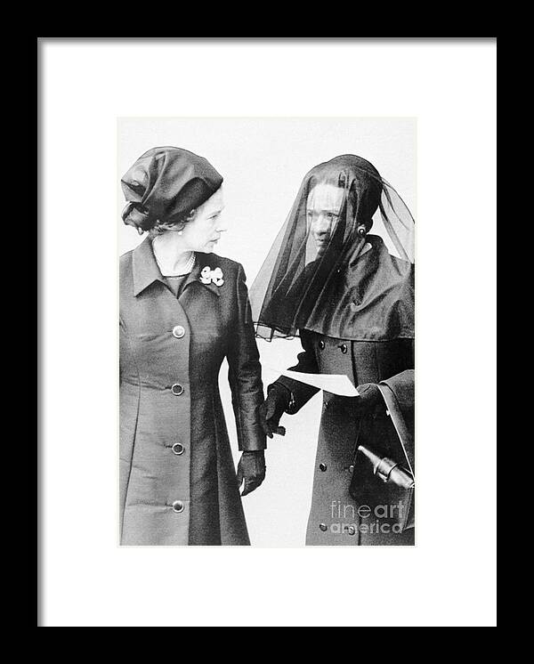 Following Framed Print featuring the photograph Queen Elizabeth With Duchess Of Windsor by Bettmann