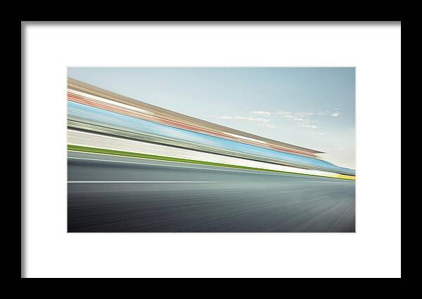 Blurred Motion Framed Print featuring the photograph Race Track Stand by Aaron Foster