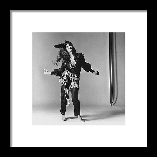 #new2022vogue Framed Print featuring the photograph Raquel Welch Dancing by Bert Stern