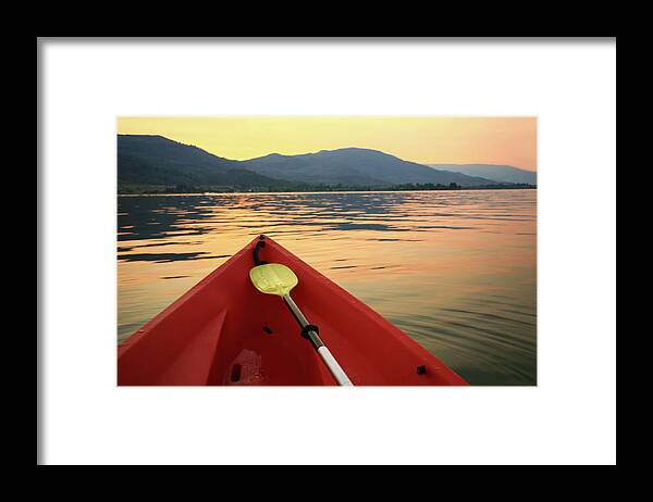 Recreational Pursuit Framed Print featuring the photograph Red Canoe On A Beautiful Mountain Lake by Imaginegolf