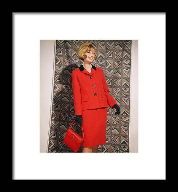 Red Suit Framed Print featuring the photograph Red Suit by Chaloner Woods