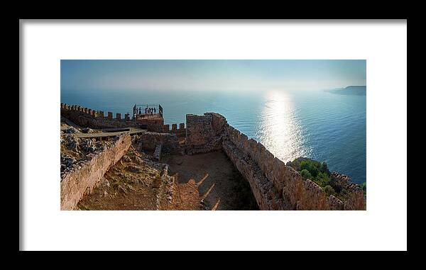 Seascape Framed Print featuring the photograph Reflections of the sun in Alanya by Sun Travels