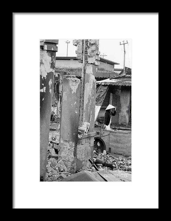Vietnam War Framed Print featuring the photograph Refugees Building A Shelter by Bettmann