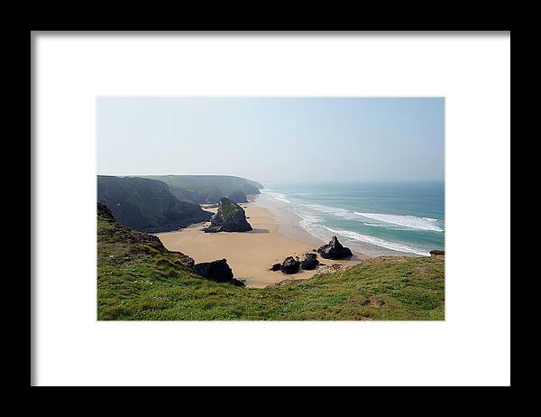 Water's Edge Framed Print featuring the photograph Rocky Coastline In Cornwall by Akrp