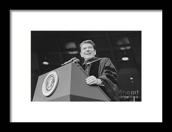 1980-1989 Framed Print featuring the photograph Ronald Reagan At Notre Dame University by Bettmann