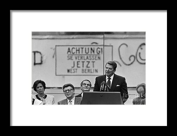 German Language Framed Print featuring the photograph Ronald Reagan At The Berlin Wall by Bettmann