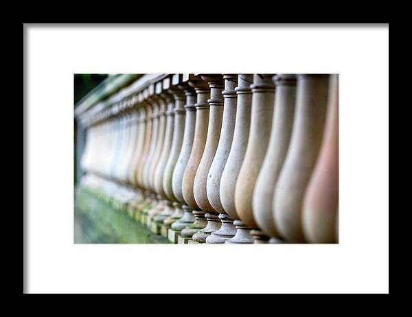 In A Row Framed Print featuring the photograph Row Of Bottles by Jung-pang Wu
