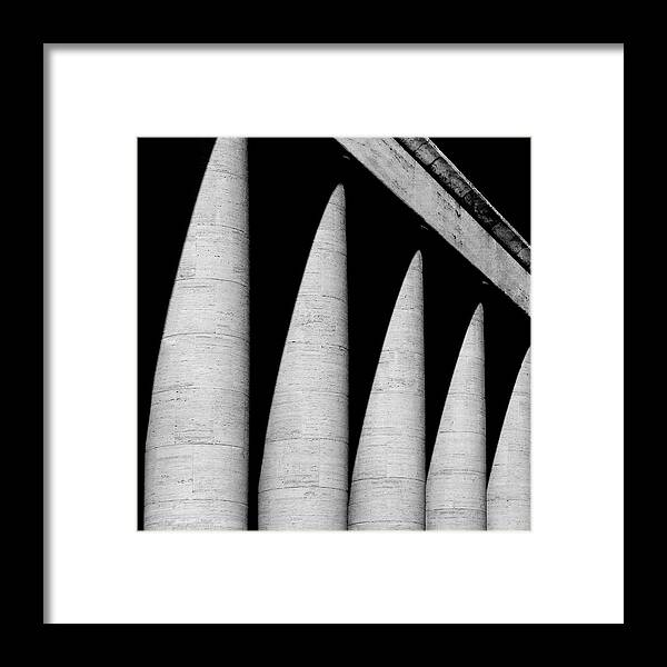 Shadow Framed Print featuring the photograph Row Of Pillars by Photo By Daniela Nobili