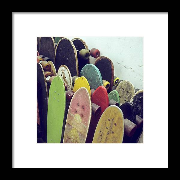 Recreational Pursuit Framed Print featuring the photograph Rows Of Used Skateboards Leaning by Fstop Images - Brian Caissie