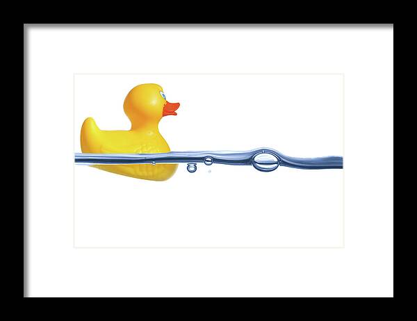 White Background Framed Print featuring the photograph Rubber Duck On Water by Yvandube