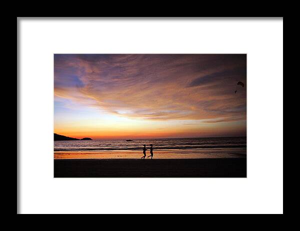 Water's Edge Framed Print featuring the photograph Running Under The Sunset Beach by Photography By Bobi