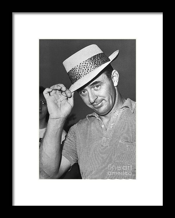 Straw Hat Framed Print featuring the photograph Sam Snead Tipping Hat by Bettmann