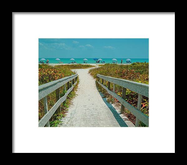 Boardwalk Framed Print featuring the photograph Sanibel Beach Umbrellas by Susan Rydberg