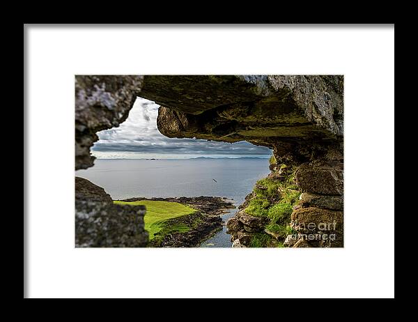 Animal Framed Print featuring the photograph Scenic View Through Stone Window At Duntulm Castle At The Coast Of The Isle Of Skye In Scotland by Andreas Berthold