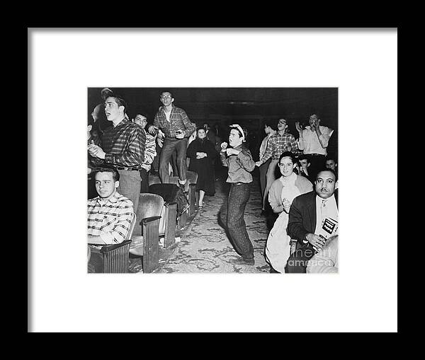 Event Framed Print featuring the photograph Screaming Fans Clap At Presley Concert by Bettmann