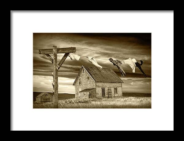Clothes Framed Print featuring the photograph Sepia Tone of Laundry on the Line by Boarded Up House by Randall Nyhof