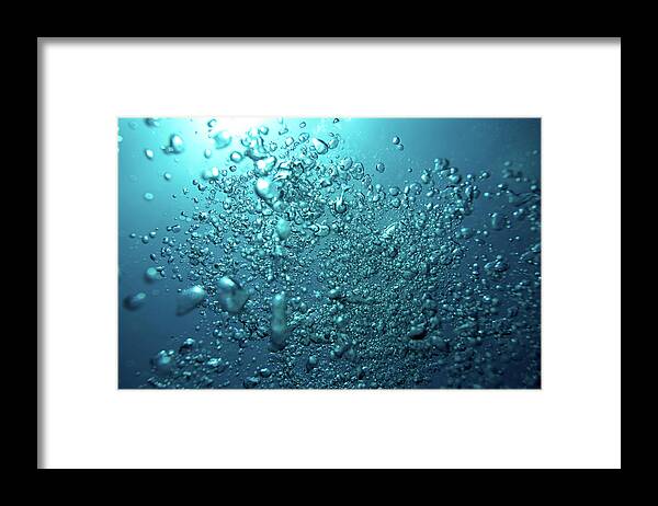 Underwater Framed Print featuring the photograph Several Bubbles Ascending From Under by Mkurtbas