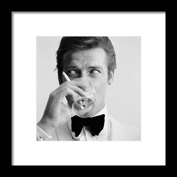 Roger Moore Framed Print featuring the photograph Shaken Not Stirred by Peter Ruck
