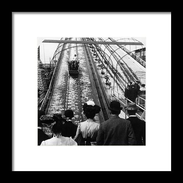 Amusement Park Framed Print featuring the photograph Shooting The Chutes by Hulton Archive