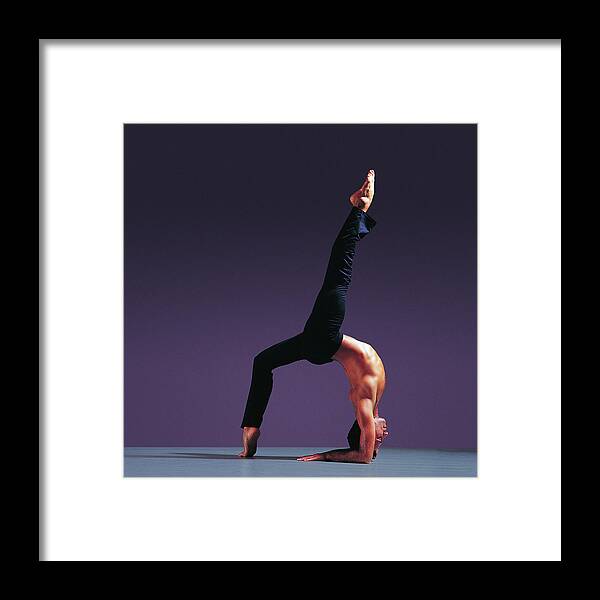 Expertise Framed Print featuring the photograph Side View Of Hispanic Male Doing A by Chris Nash
