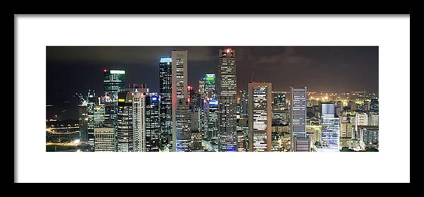Scenics Framed Print featuring the photograph Singapore Skyline At Night - Aerial by Chrisp0