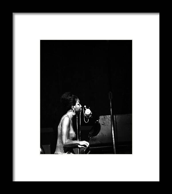 Nina Simone Framed Print featuring the photograph Singer Nina Simone Performs At The Jazz by New York Daily News Archive
