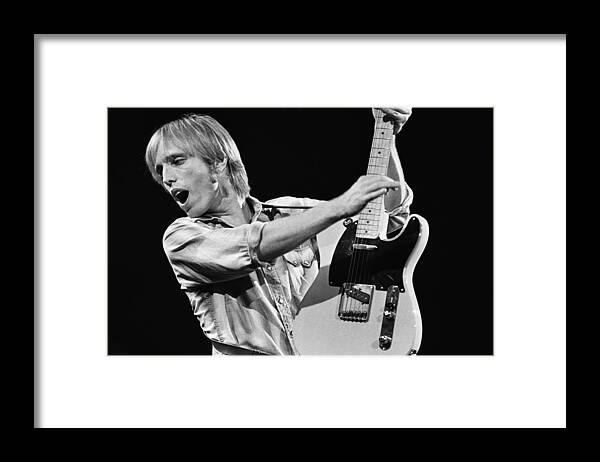 Tom Petty Framed Print featuring the photograph Singer Tom Petty Performs In Concert by George Rose