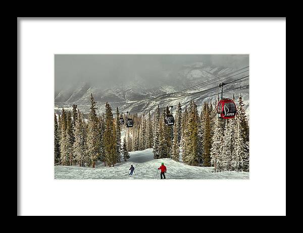 Aspen Gondola Framed Print featuring the photograph Skiers Under The Aspen Gondola by Adam Jewell