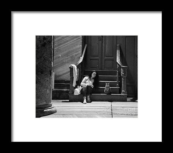 Girl And Cat Framed Print featuring the photograph Small talk between girl and cat - Black and white by Yavor Mihaylov
