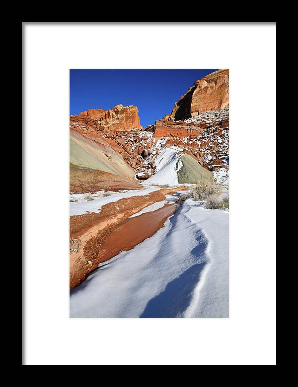 Capitol Reef National Park Framed Print featuring the photograph Snow Melts Beneath Cohab Canyon by Ray Mathis