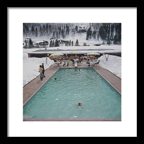Child Framed Print featuring the photograph Snow Round The Pool by Slim Aarons