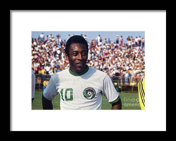 Soccer Uniform Framed Print featuring the photograph Soccer Favorite Pele Posing by Bettmann