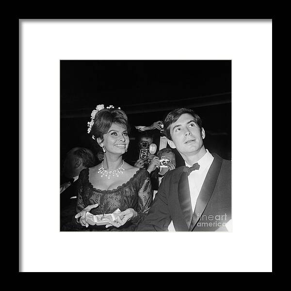 Film Festival Framed Print featuring the photograph Sophia Loren And Anthony Perkins by Bettmann