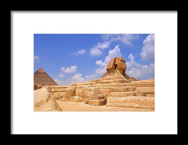 Statue Framed Print featuring the photograph Sphinx And The Pyramids Of Giza by Hhakim