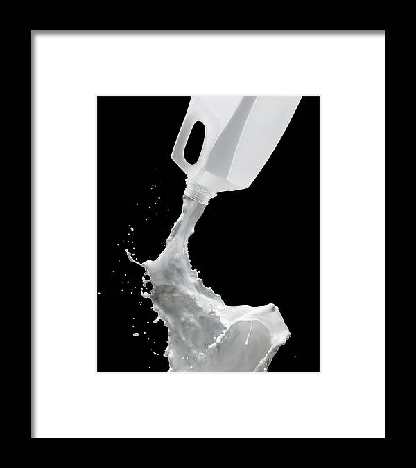 Milk Framed Print featuring the photograph Spilt Milk by Chris Stein