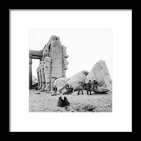 People Framed Print featuring the photograph Statue Of Rameses II At The Ramesseum by Bettmann