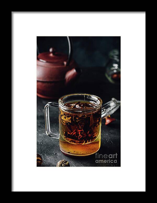 Orange Color Framed Print featuring the photograph Steeping Red Tea In Glass Mug by Vsevolod Belousov / 500px