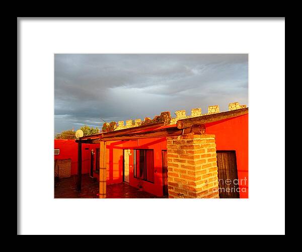 Red Building Reflecting Setting Sun Framed Print featuring the photograph Sun Setting Storm Brewing by Rosanne Licciardi