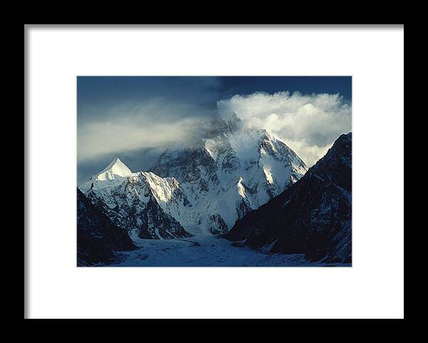 00260197 Framed Print featuring the photograph Storm Engulfing K2 by Colin Monteath