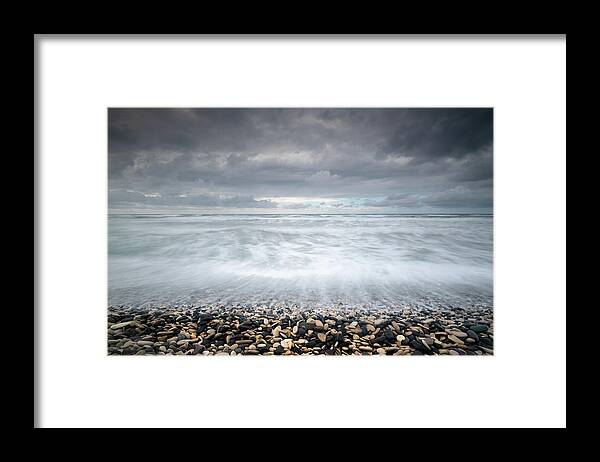 Coast Framed Print featuring the photograph Stormy Sky and Wavy ocean by Michalakis Ppalis