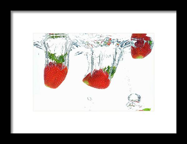 Underwater Framed Print featuring the photograph Strawberries Dropping Into Water by Sami Sarkis