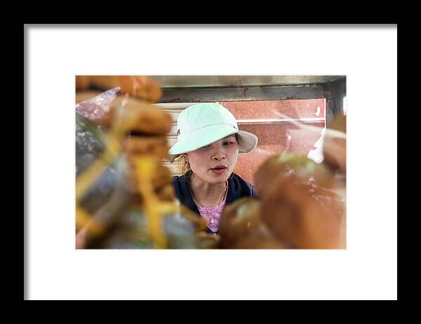 Saigon Framed Print featuring the photograph Street Food Vendor Has Baguettes Ready To Make Banh Mi Sandwiches by Cavan Images