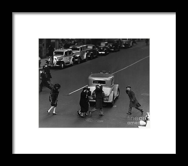 Wind Framed Print featuring the photograph Street Scene On Windy Day by Bettmann