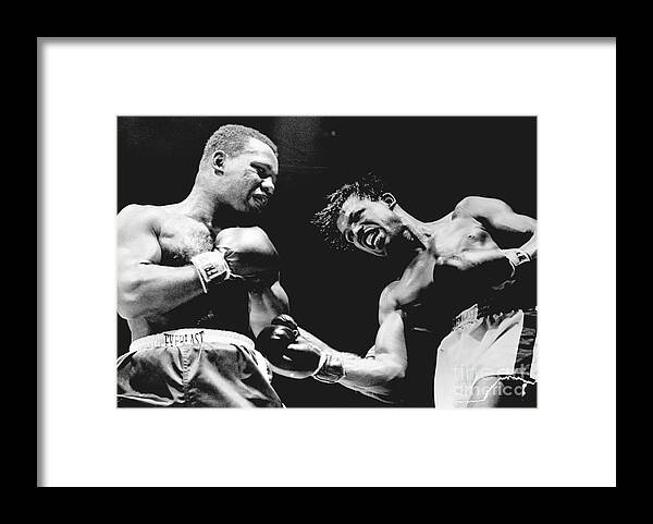 People Framed Print featuring the photograph Sugar Ray Robinson And Ralph Jones by Bettmann