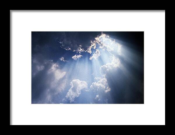 Tranquility Framed Print featuring the photograph Sun Rays Breaking Through Cloud by Andrew Holt