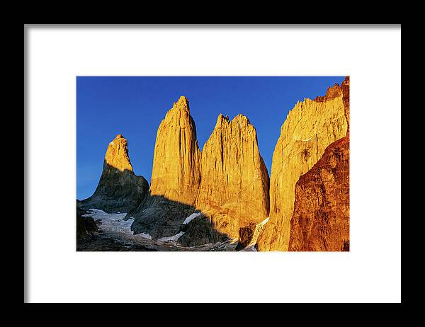Chile Framed Print featuring the photograph Sunrise at Torres del Paine Peaks in Chilean Patagonia by Kamran Ali