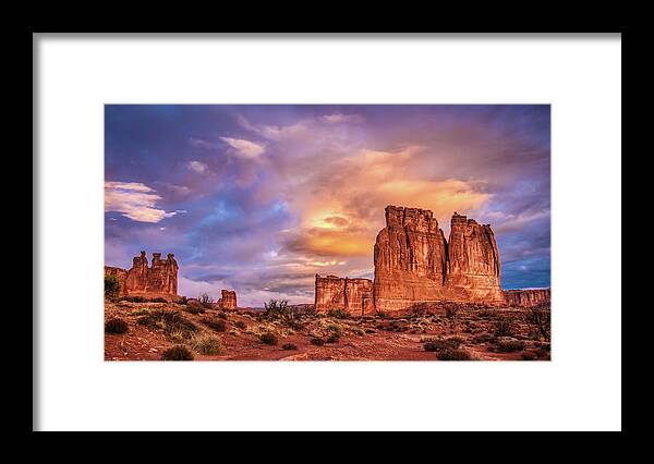 Arches National Park Framed Print featuring the photograph Sunrise on The Organ, Tower of Babel and the Three Gossips by Brenda Jacobs