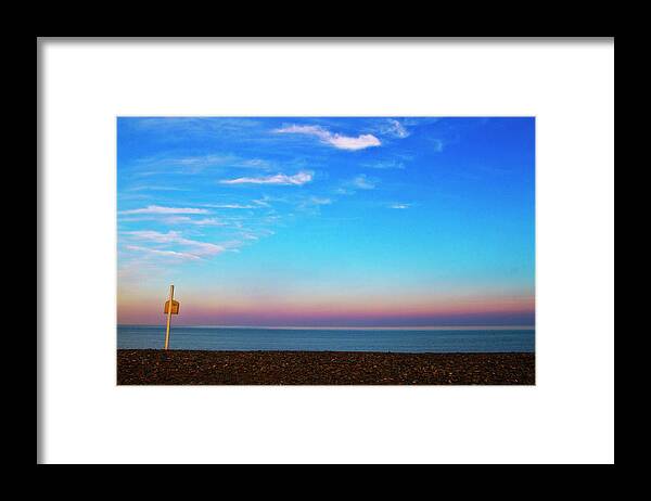 Scenics Framed Print featuring the photograph Sunset On Empty Beach With Lifebouy On by Image By Catherine Macbride